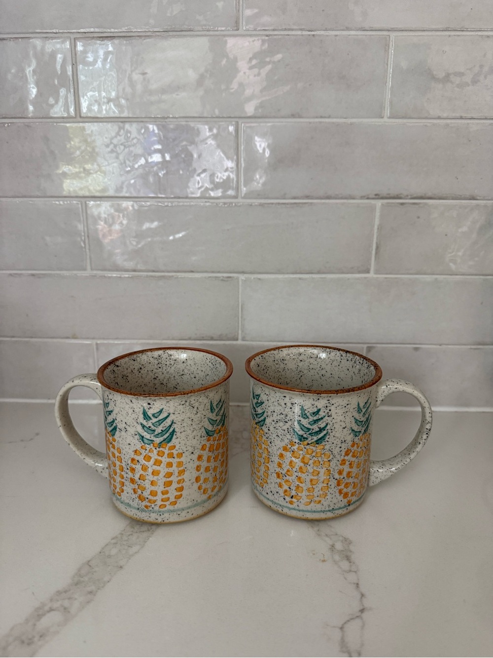 Anthropologie Speckled Ceramic Mugs with Yellow Pineapple Motif